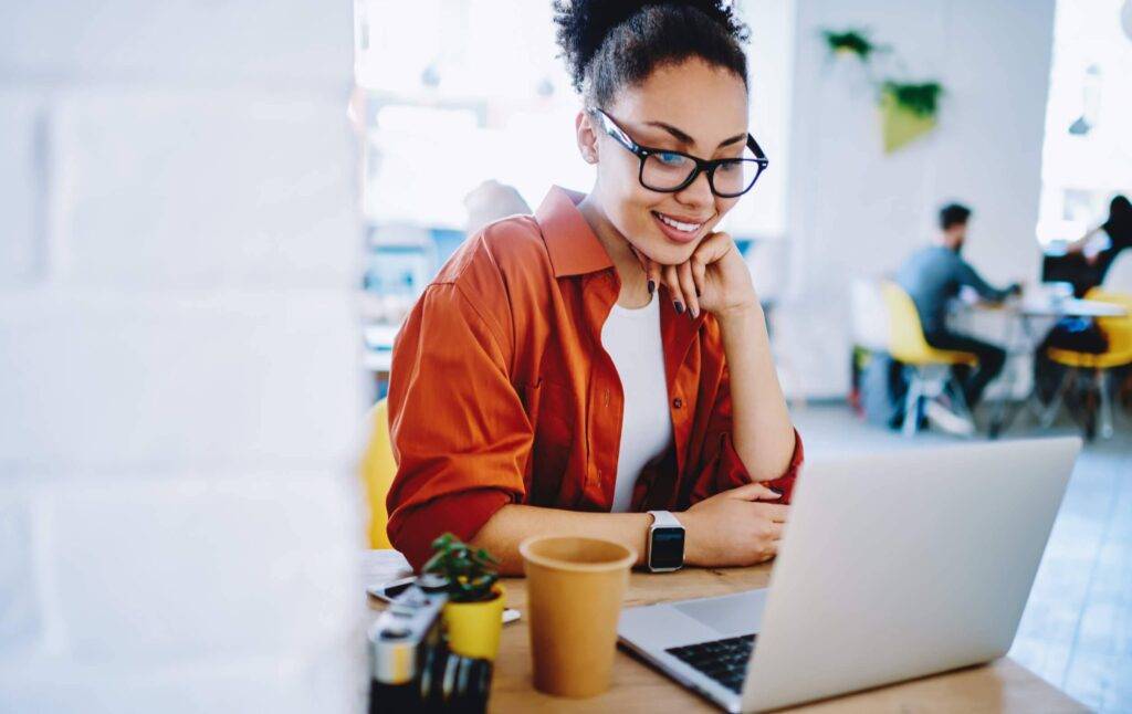 woman looking at laptop